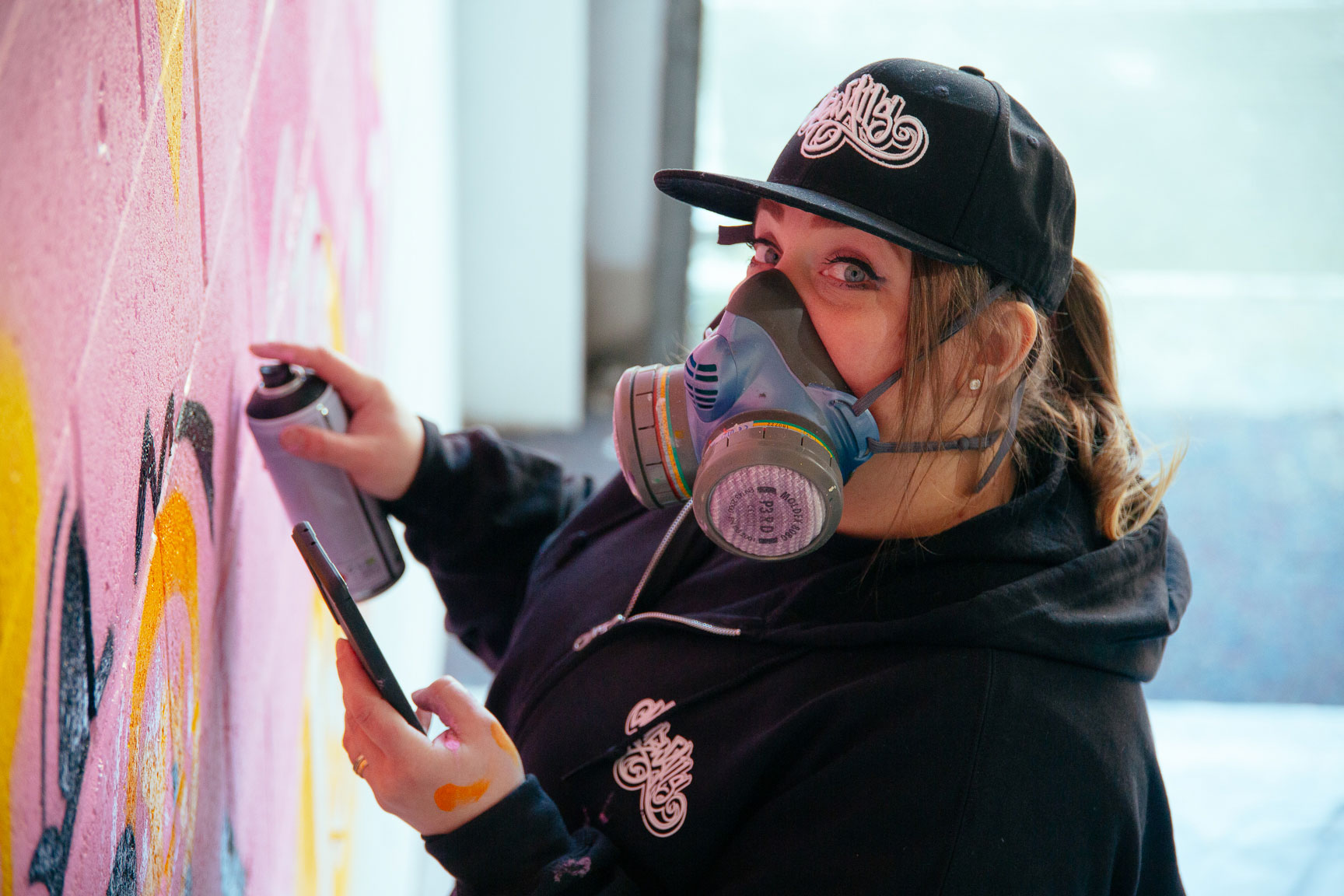 Artist developing the Cheer Bear mural