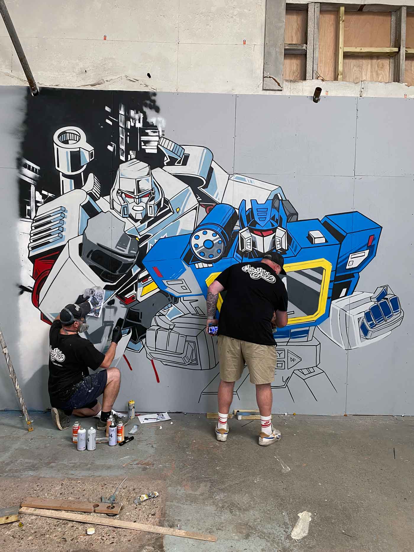 Completed Megatron and Soundwave street-art mural